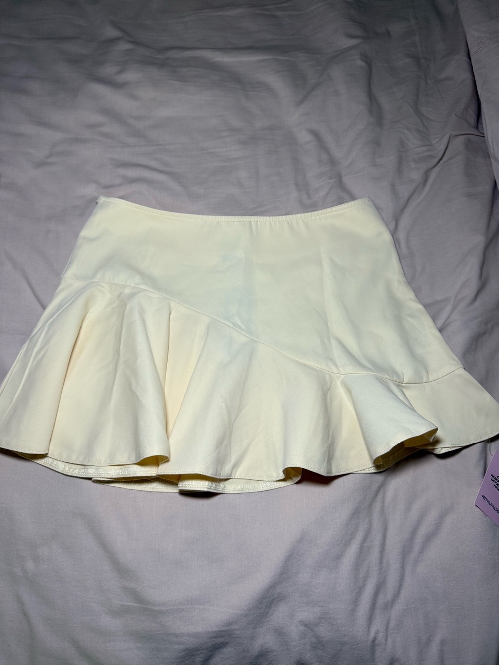 PrettyLittleThing Cream Flounce Mini Skirt